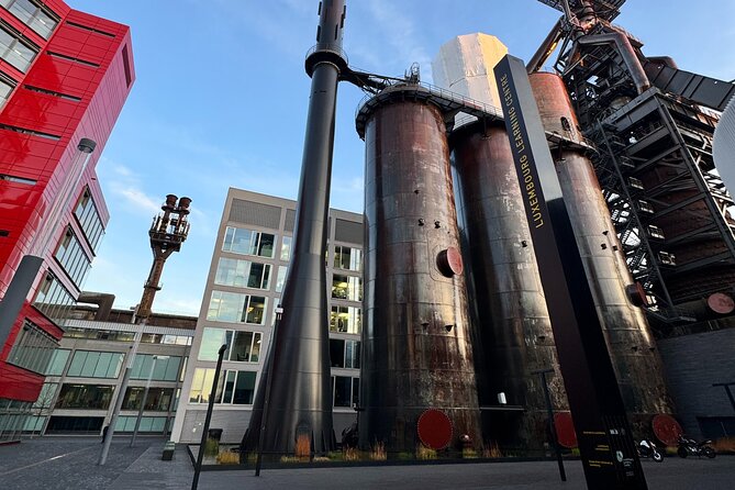 From Iron to Wealth, Luxembourg Steel and Mining Heritage - ARBED headquarters and the ArcelorMittal Steel Monument in Grund