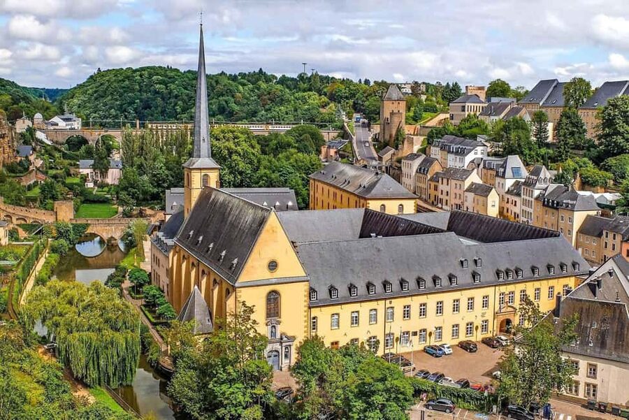 The essentials of Luxembourg: Every step a story - Constitution Square, the Monument of Remembrance, and the river finish